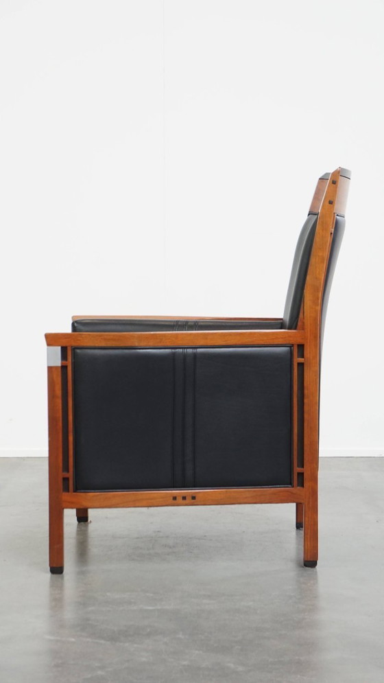 Image 1 of Black cowhide leather and wood Art Deco design armchair by Schuitema from the decoforma series
