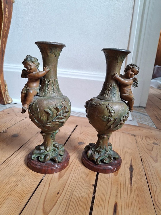 Image 1 of Pair of Art Nouveau spelter vases, circa 1900, with cherubs and a double patina
