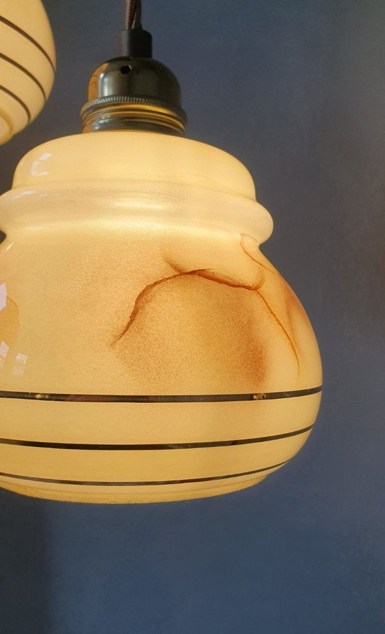 Image 1 of vintage gemarmerde opaline hanglampen met gouden decoratie