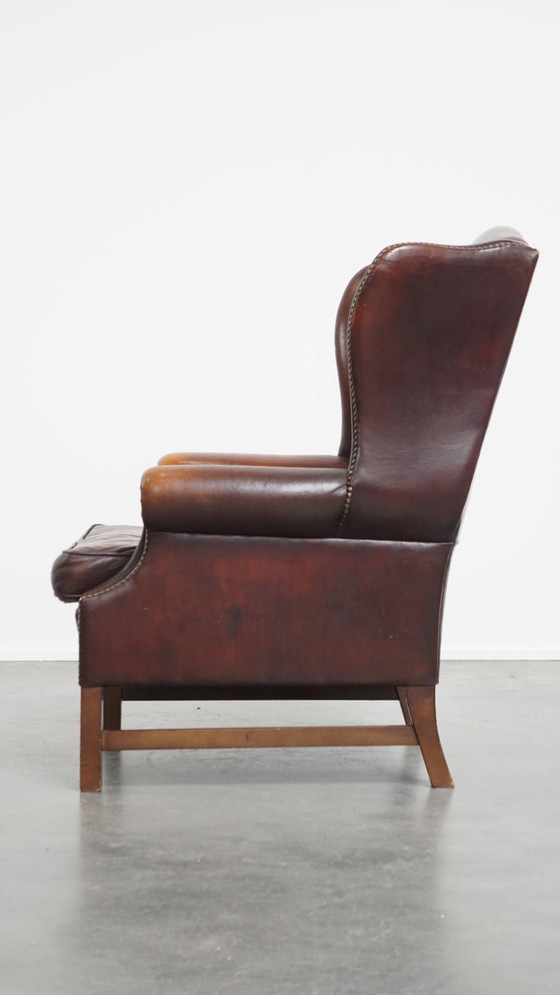Image 1 of Donkere Engelse stijl schapenleren oorfauteuil