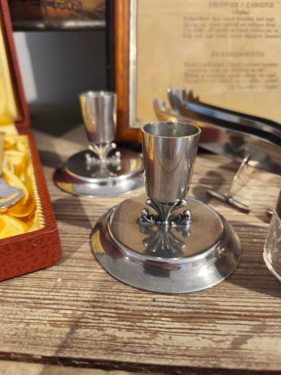 Image 1 of Posate antiche, candeliere e contenitore in argento del 1919.