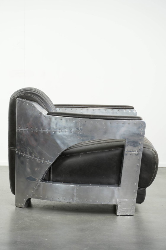 Image 1 of Fauteuil/robinet de style aviateur unique et confortable en cuir de vachette, finitions aluminium et rivets