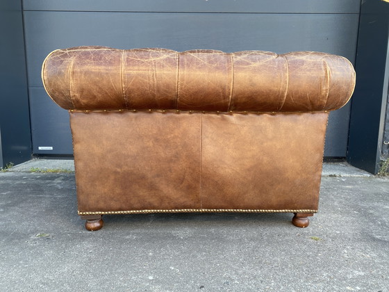 Image 1 of Twee stoere Chesterfield club fauteuils vintage sigaren cognac 