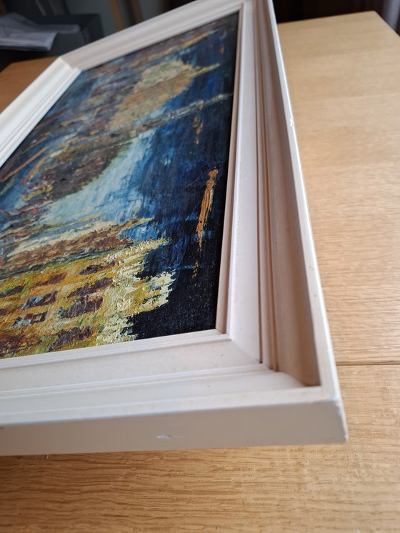 Image 1 of Schilderij stadsgezicht in de avond.