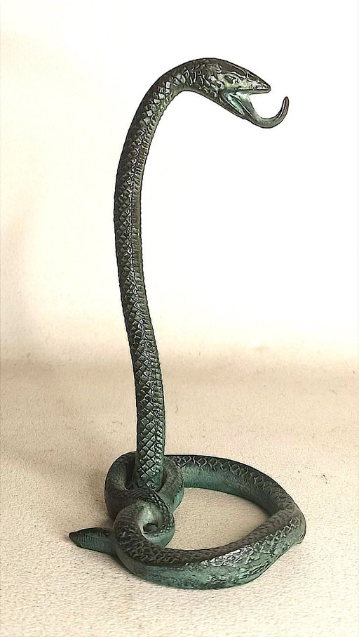 Cobra bronzen zakhorlogehouder van Edgar Brandt, in art-decostijl.