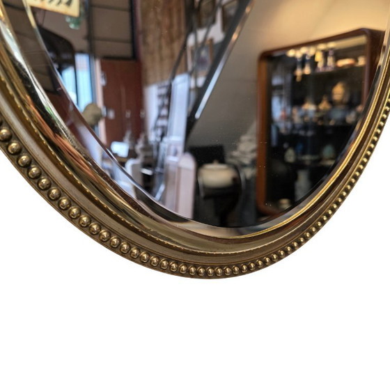 Image 1 of French style brass mirror with bow