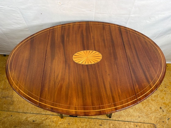 Image 1 of Antique Edwardian Mahogany Oval Drop Leaf Side Table (Circa 1900–1930)  A beautiful antique Edwardian oval drop leaf side table 