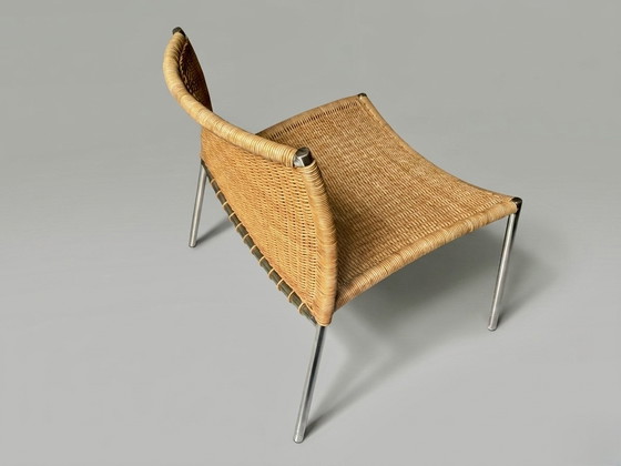 Image 1 of Vintage rattan lounge chair with chrome legs