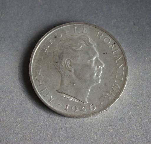 ROMANIA 100000 LEI uit 1946, zilveren munt, 700 fijnheid, tekenen van ouderdom en slijtage.