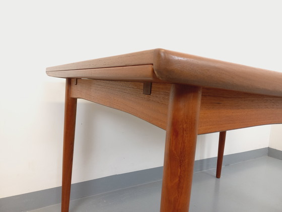 Image 1 of Scandinavian 60's vintage Dyrlund rectangular teak dining table with extensions