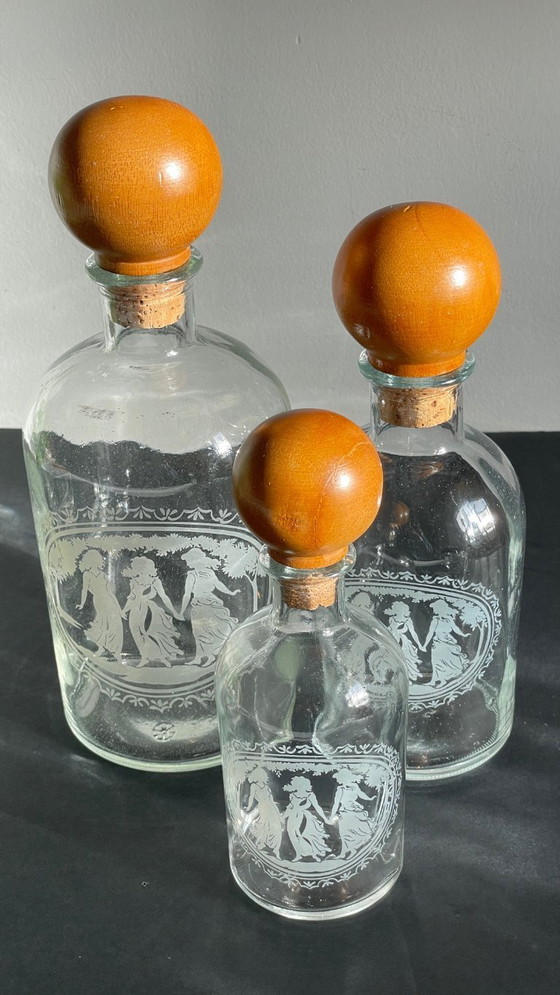 Image 1 of Vintage Engraved Glass and Wood Bottles