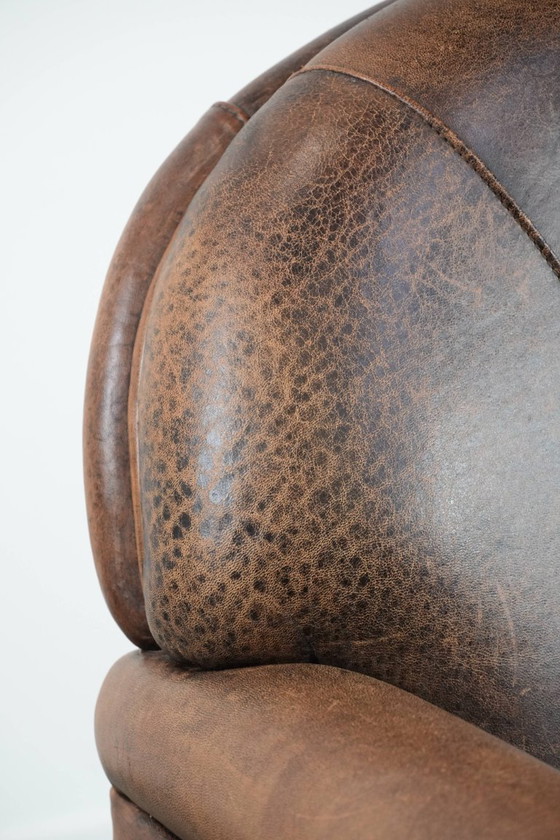 Image 1 of Mooie vintage schapenleren fauteuil/armchair met warme kleuren