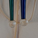 Lampada da parete doppia Ducale di Artemide Design, in vetro di Murano bicolore.