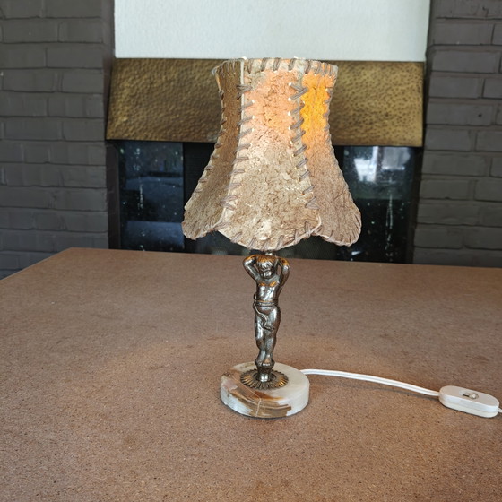 Image 1 of Vintage Tribal Figurine Table Lamp with Hand-Stitched Rawhide Shade and Onyx Base