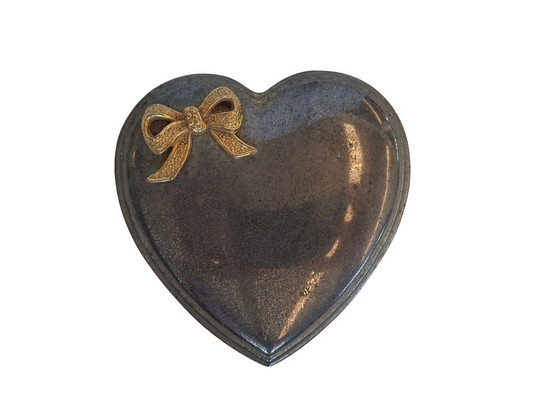 Image 1 of Heart-Shaped Metal Jewelry Box with Gold Bow and Red Velvet Interior