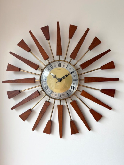 Hermoso reloj de pared vintage Manley con forma de estrella o sol, años 60