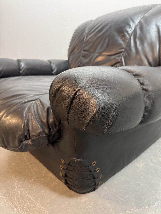 Image 1 of Beautiful Big Black Leather Postmodern Italian Design Space Age Lounge Chair with Brass Buttons and Playful Cord Lacing, 1970s.
