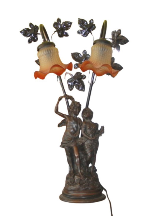 Lampada da tavolo Art Nouveau placcata in bronzo, firmata, alta circa 60 cm.