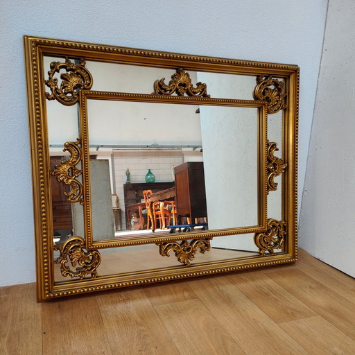 Miroir de cheminée baroque rococo doré vintage.