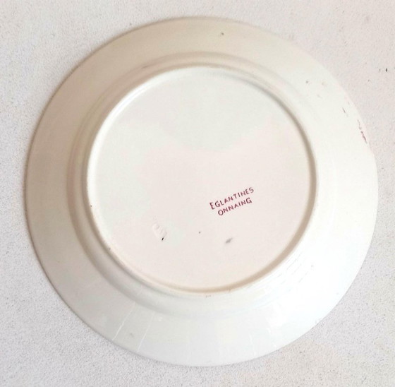 Image 1 of Set of 8 Terre de Fer plates, Eglantines pattern, late 18th century, 22.5 cm diameter