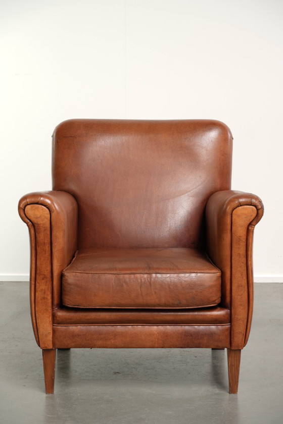 Stoere Vintage Schapenleren Armchair Met Een Mooie Cognac Kleur En Een Comfortabele Zit – Fauteuils, Leather (photo 2 of 13)