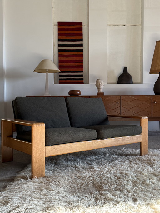 DIVANO 2 POSTI CARL STRAUB IN LEGNO DI FRASSINO E TESSUTO BOUCLÉ, ANNI '70