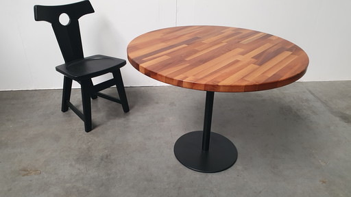 Round mixed wood table 100cm cast iron base Pedrali