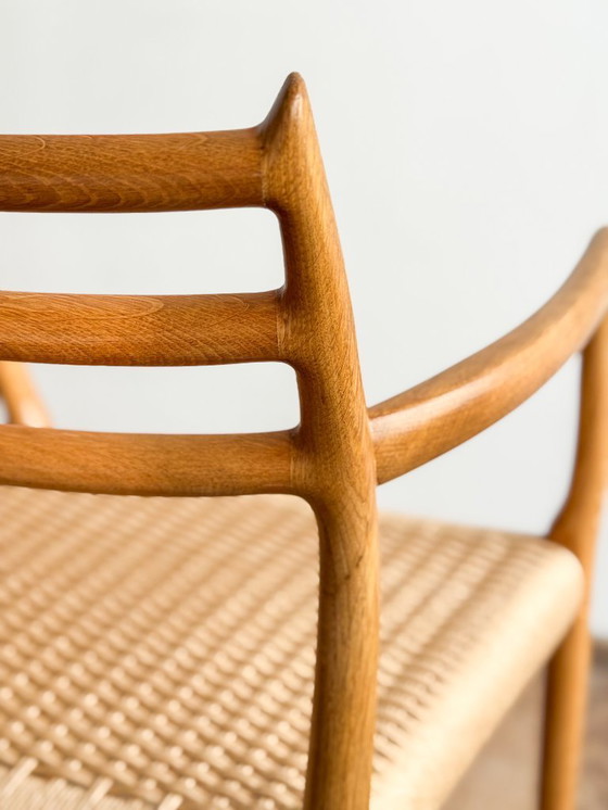 Image 1 of Esszimmerstuhl mit Armlehnen aus Eichenholz, Modell 62 für J.L. Moller