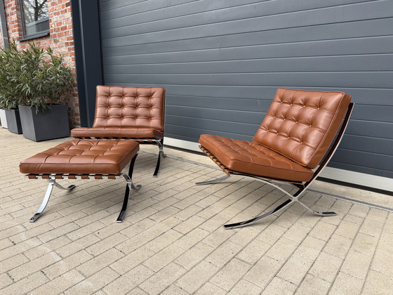 Image 1 of Lot de 2 fauteuils inclinables Knoll Barcelona d'origine + repose-pieds, cuir Venezia Cognac, neufs dans leur boîte.