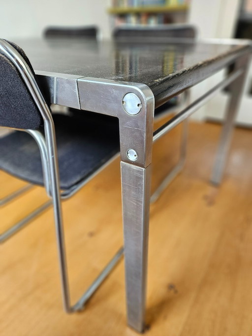 Vintage dining table with 4x tube chairs | Bataille & Ibens