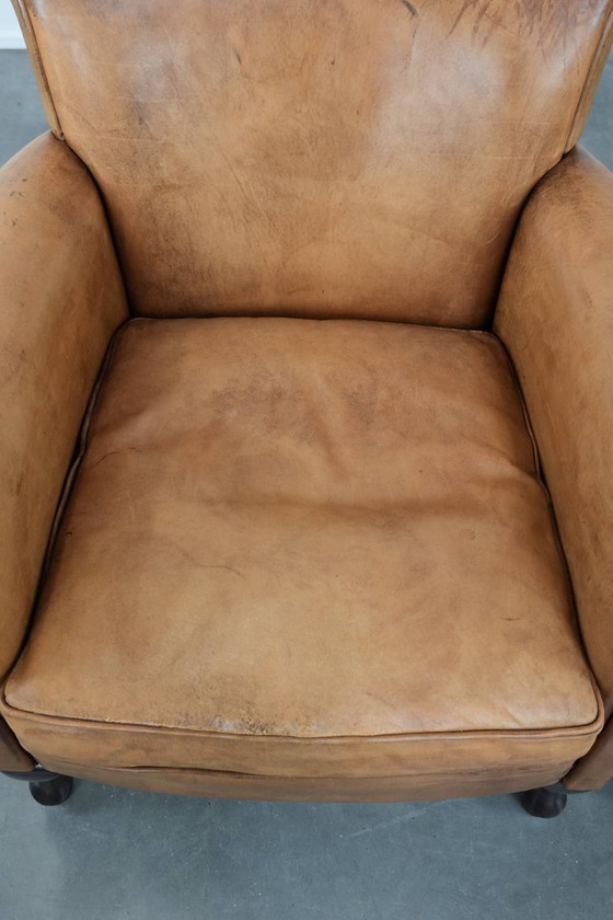 Image 1 of 2 x Subtiele vintage schapenleren fauteuil met een mooie lichte kleur