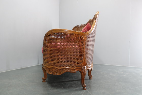 Image 1 of Antico divano intagliato con sponde a canne, Cecoslovacchia