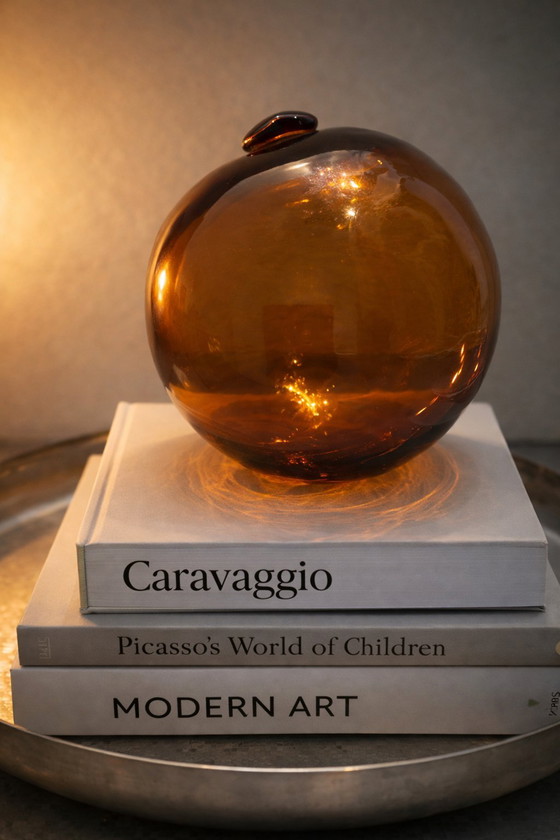 Image 1 of Flotador de pesca antiguo de cristal ámbar – Arte náutico de mediados de siglo