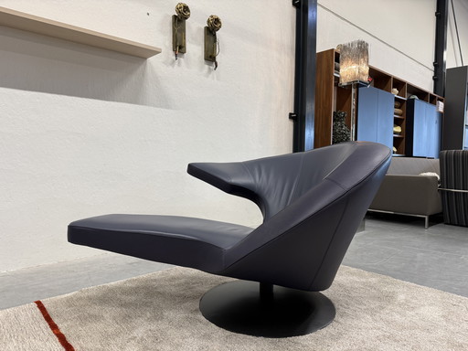 Fauteuil pivotant Leolux Parabolica en cuir bleu