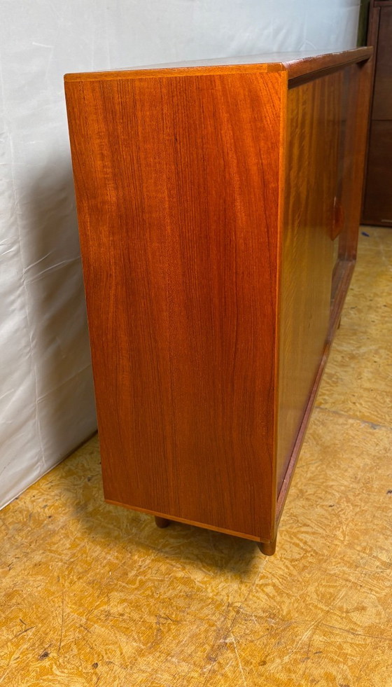 Image 1 of Mid Century Retro Teak & Glass Bookcase by Herbert E. Gibbs Circa 1960  A stylish and elegant mid century modern teak and glass 