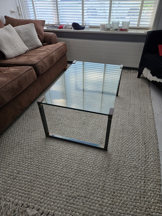Image 1 of Coffee table made of sturdy glass and a designer metal frame