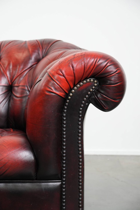 Image 1 of Rode rundleren chesterfield buttonseat fauteuil