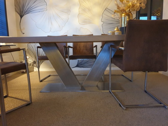 Image 1 of tavolo da pranzo in legno con struttura in acciaio inox