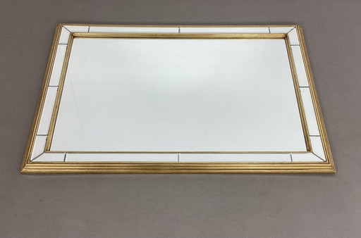 Specchio sfaccettato Deknudt in stile Hollywood Regency con cornice
