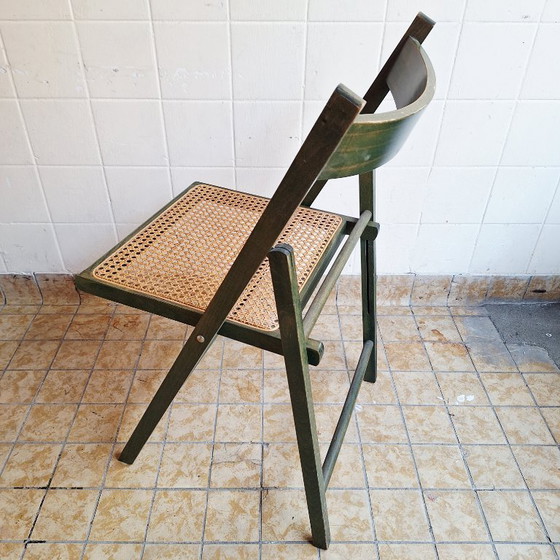 Image 1 of Sedia pieghevole vintage in legno con seduta in rattan