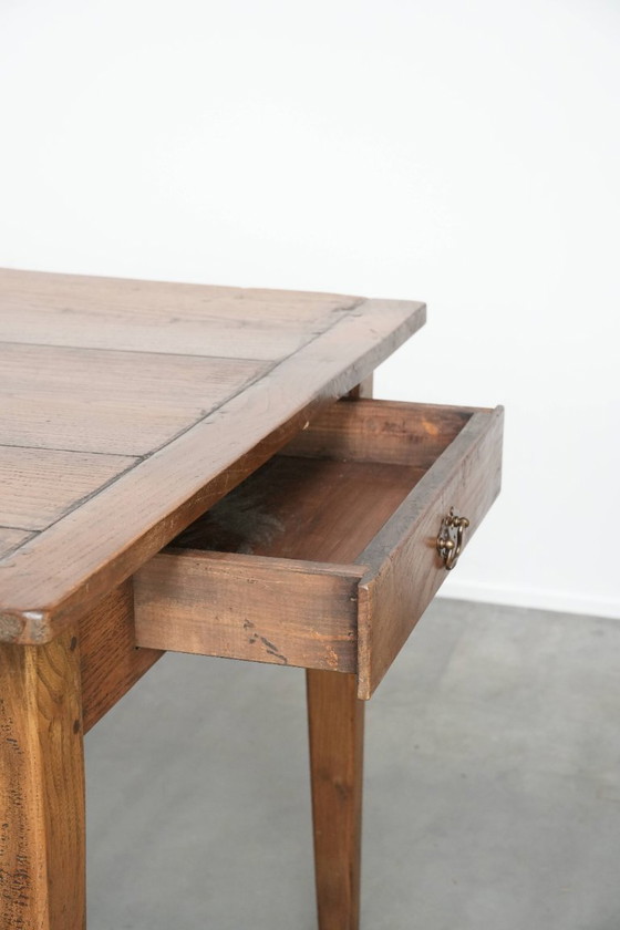 Image 1 of Antique French oak farmhouse dining table for 6 to 8 people with three drawers