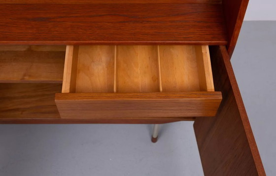 Image 1 of Deense teakhouten kast en schrijftafel/bar, van Arne Vodder, jaren 60.