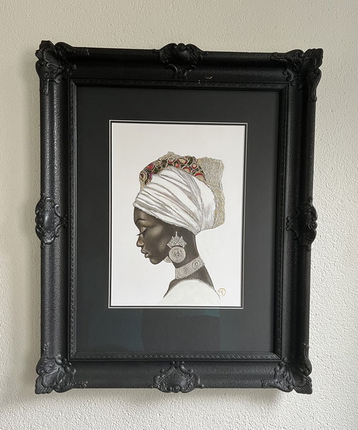 Portrait d'une femme noire dans un cadre à barrette