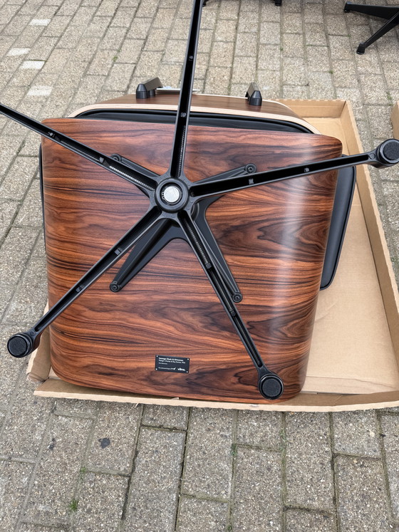 Image 1 of 2 poltrone lounge Vitra Eames XL originali con poggiapiedi, in pregiata pelle nera e palissandro Santos, NUOVE!!