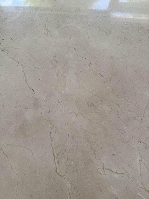Mesa de comedor de mármol