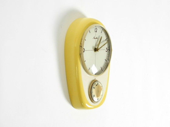Image 1 of Beautiful battery-operated Mid-Century Modern wall clock by Mauthe with a glazed ceramic case