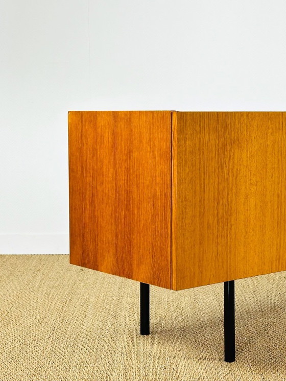 Image 1 of Minimalist Scandinavian sideboard in teak with black metal legs, 1960