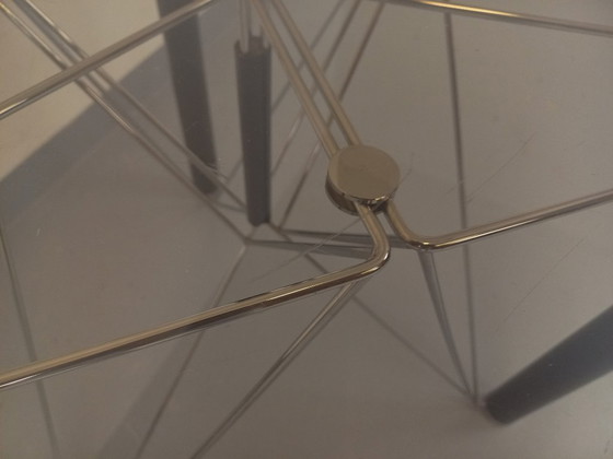 Image 1 of Vintage round dining table in smoked glass, black metal and chrome metal from the 80s