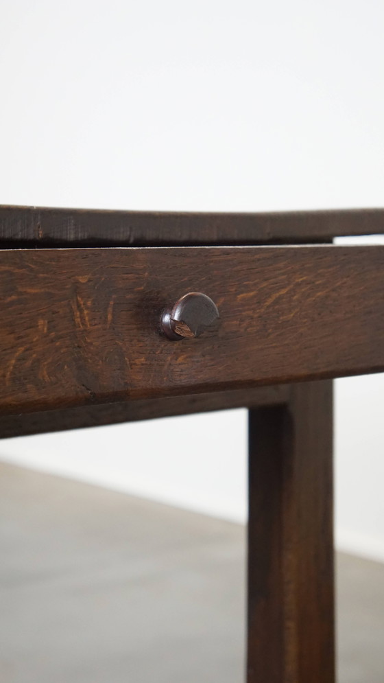 Image 1 of Antique early 19th century French dining table made of oak with 1 drawer