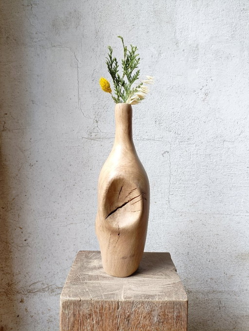 Vase/bottle in carved solid oak